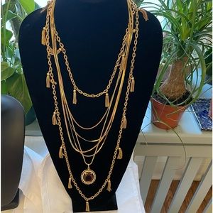 Group of four vintage goldtone necklaces